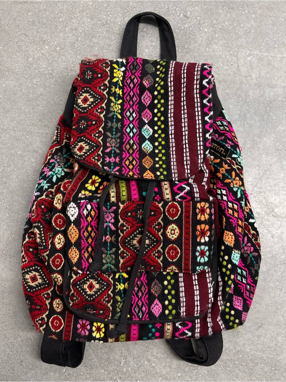 Catori woven boho flap backpack- multi color
